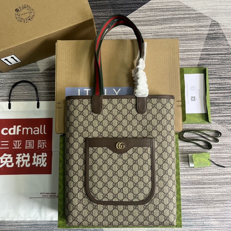 G*u*i shopping bags